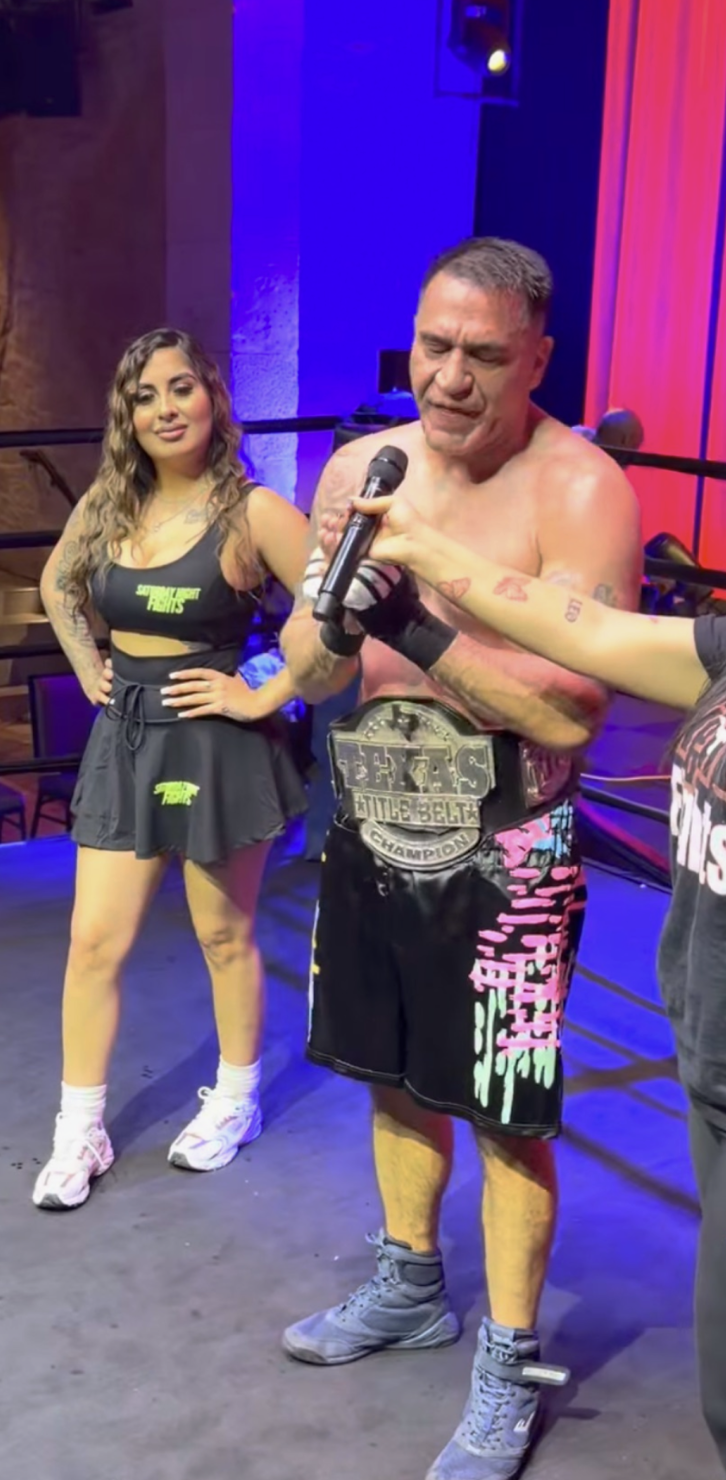 Francisco Rodriguez Texas Cruiserweight State Champion with championship belt at Saturday Night Fights - Empire Boxing DFW coach Plano Texas