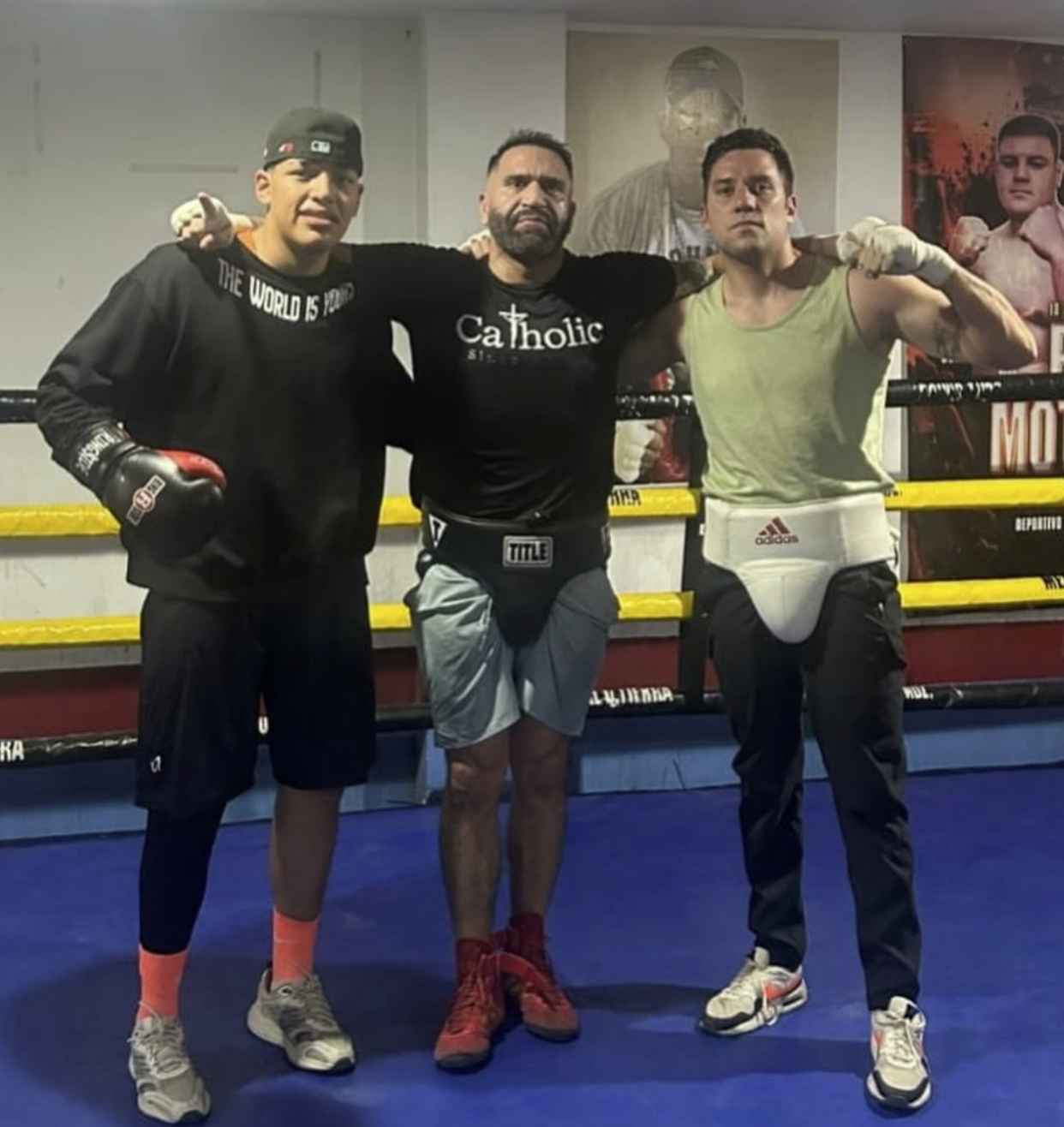 Coach Francisco with fighters at boxing ring - Empire Boxing DFW Plano Dallas